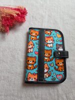 Porta documentos gatos